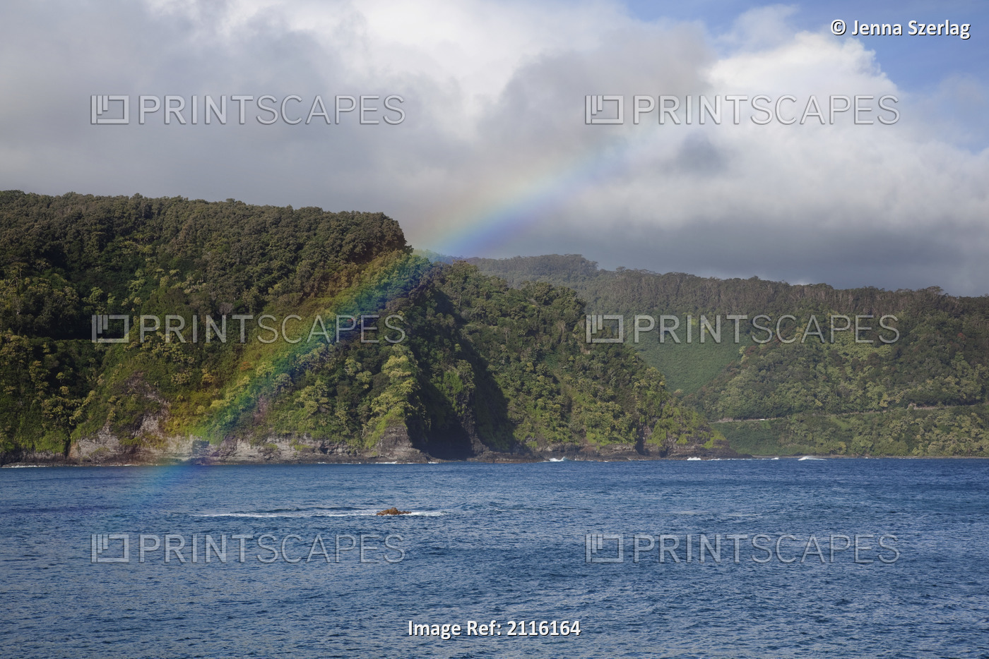 Hawaii, Maui, A rainbow forms over the road to Hana in Keanae.