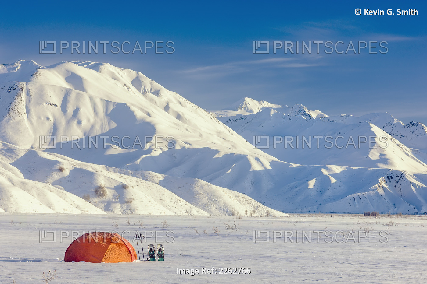 A Backpacking Tent With Snowshoes Next To It With The Alaska Range In The ...