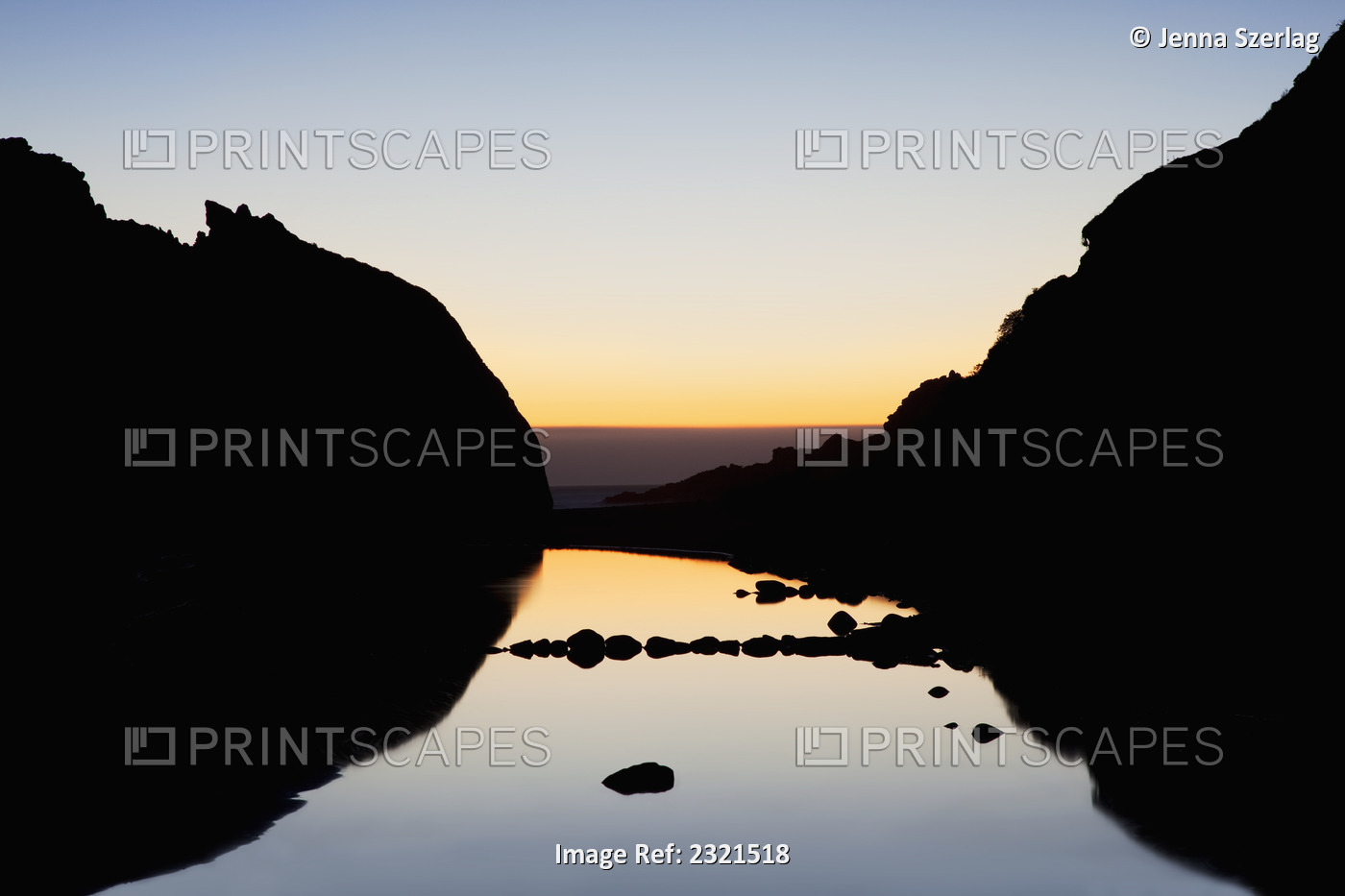 California, Big Sur, Sun Setting Over Pacific Ocean, Silhouetted Mountains In ...