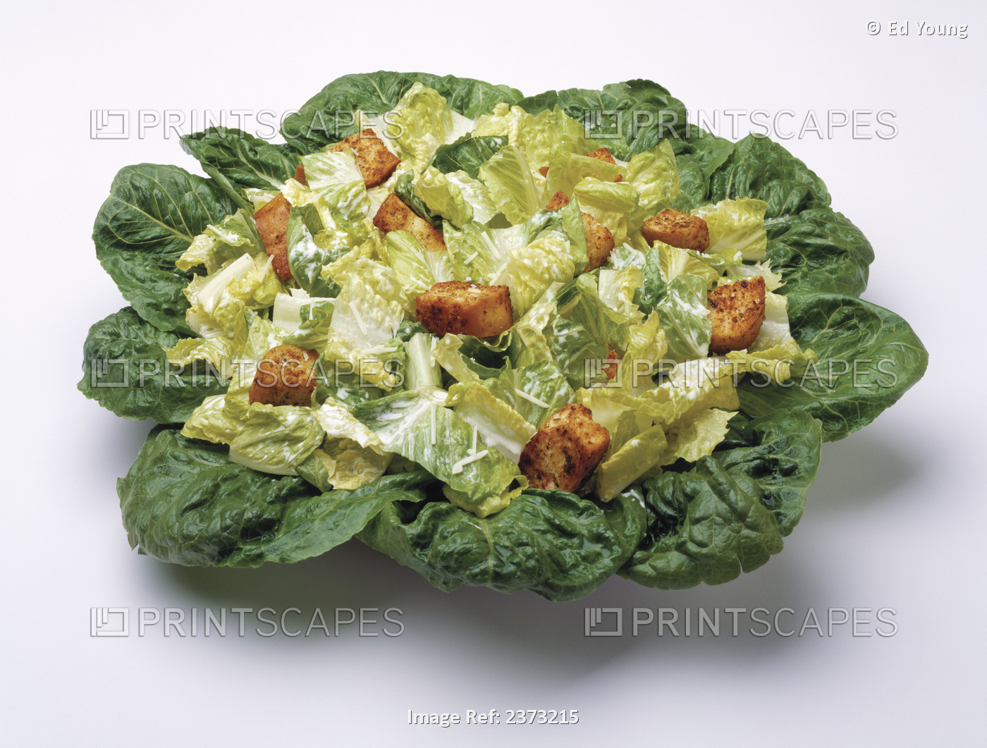 Food - Caesar salad prepared with Romaine lettuce, dressing, parmesan cheese ...