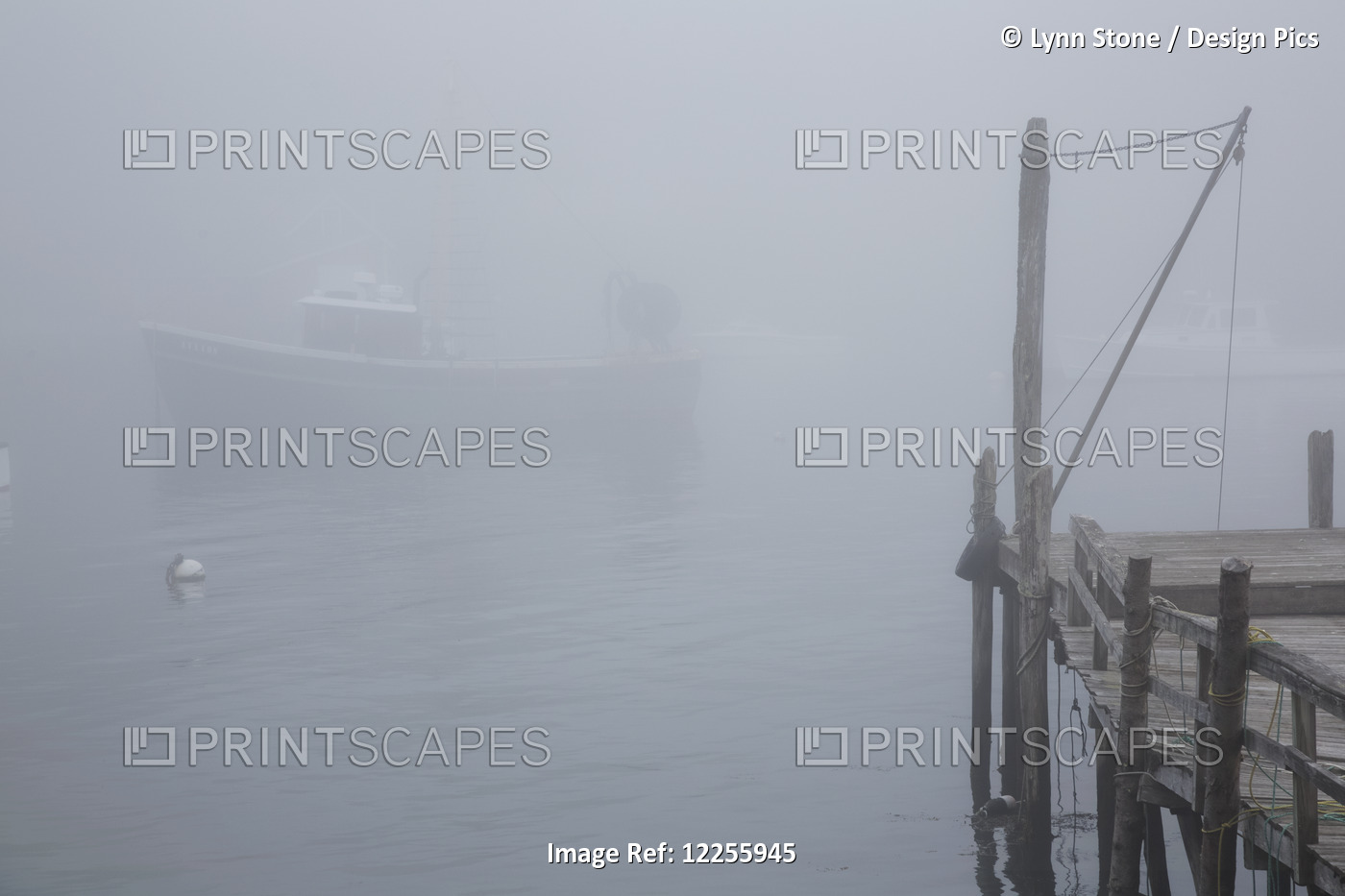 Lobster Boat And Boat Dock In Fog; New Harbor, Maine, United States Of America