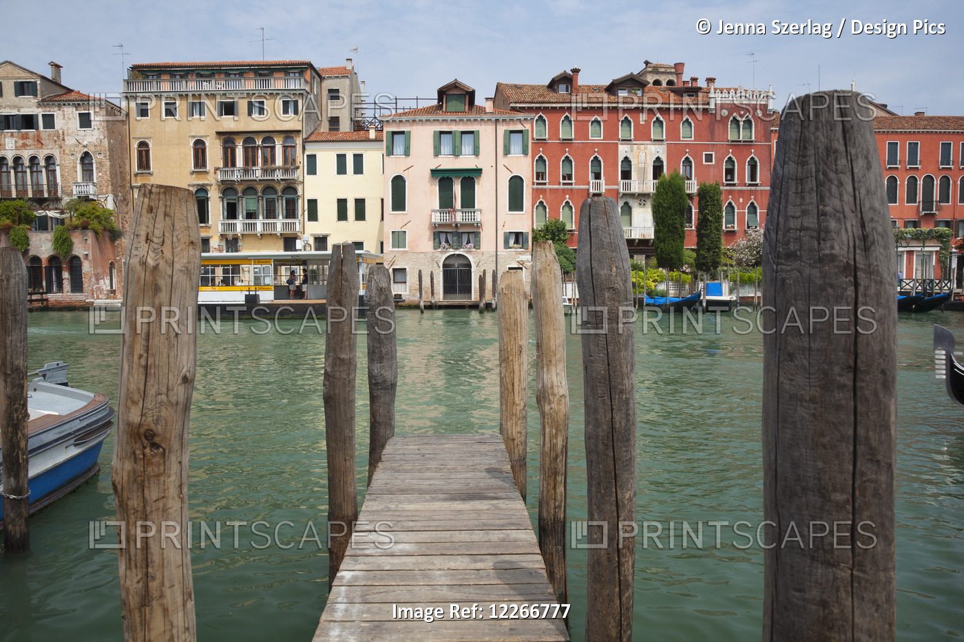 Colourful Buildings On The Grand Canal From A Dock; Venice, Italy