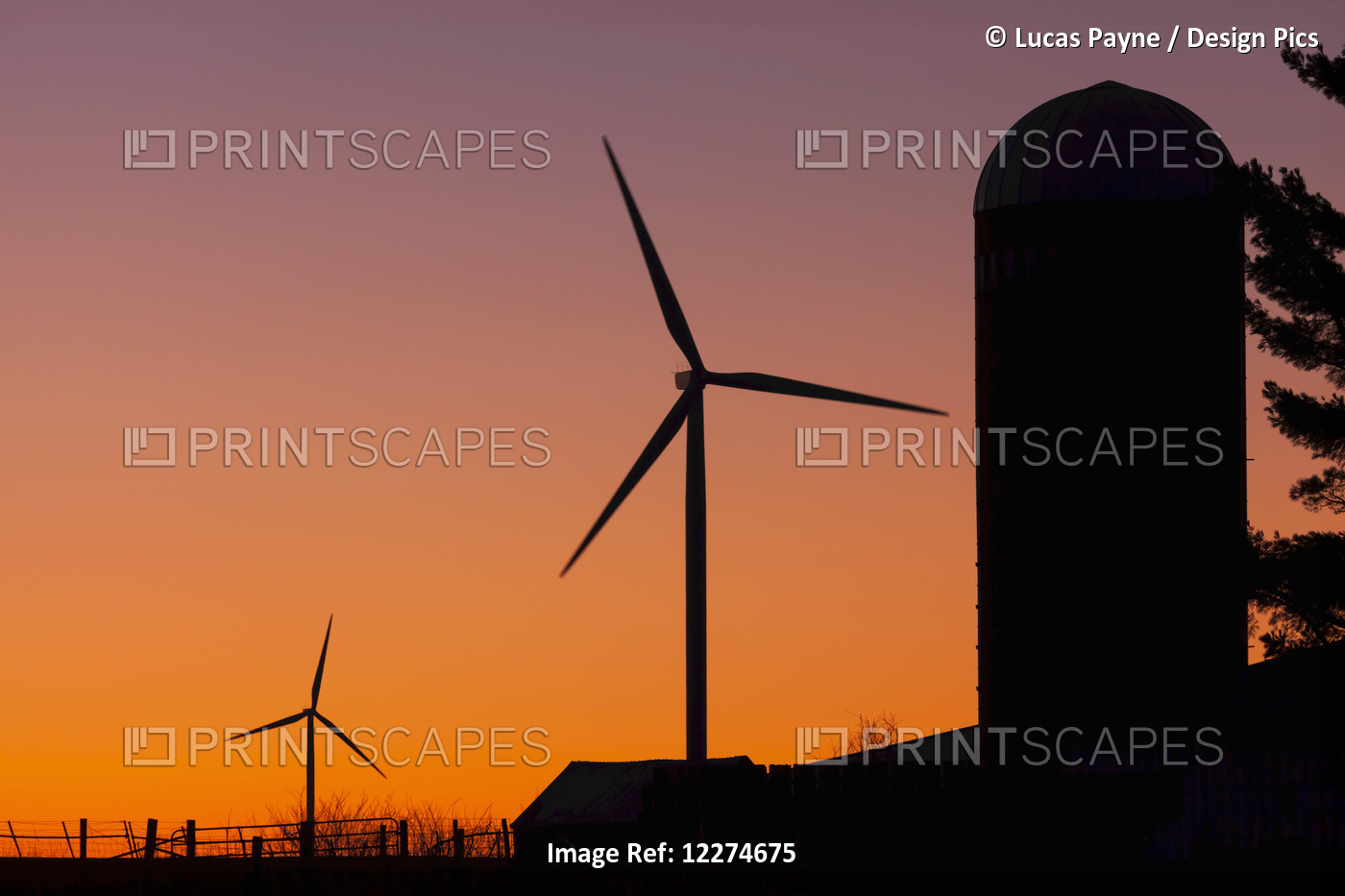 Elk Wind Energy Farm And A Silo At Sunrise, Near Edgewood; Iowa, United States ...