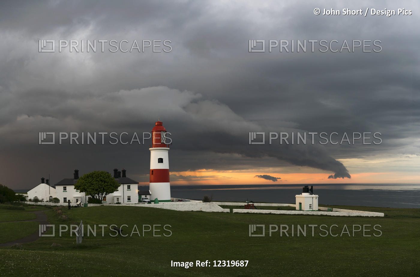 Souter Lighthouse Along The Coast Under Ominous Storm Clouds; South Shields, ...