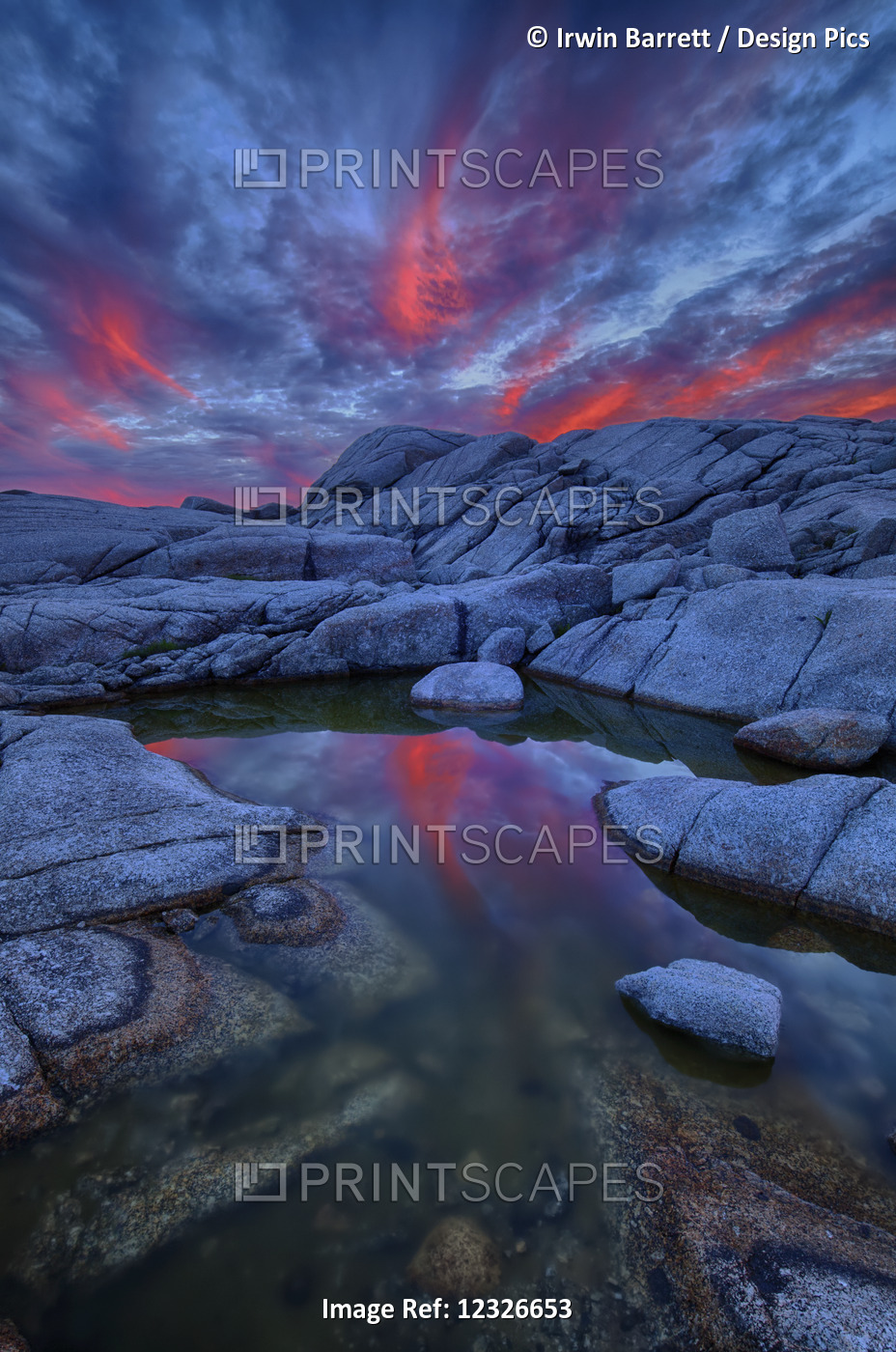 Coastal Rock Pool And Flaming Clouds At Sunset Near Prospect; Nova Scotia, ...