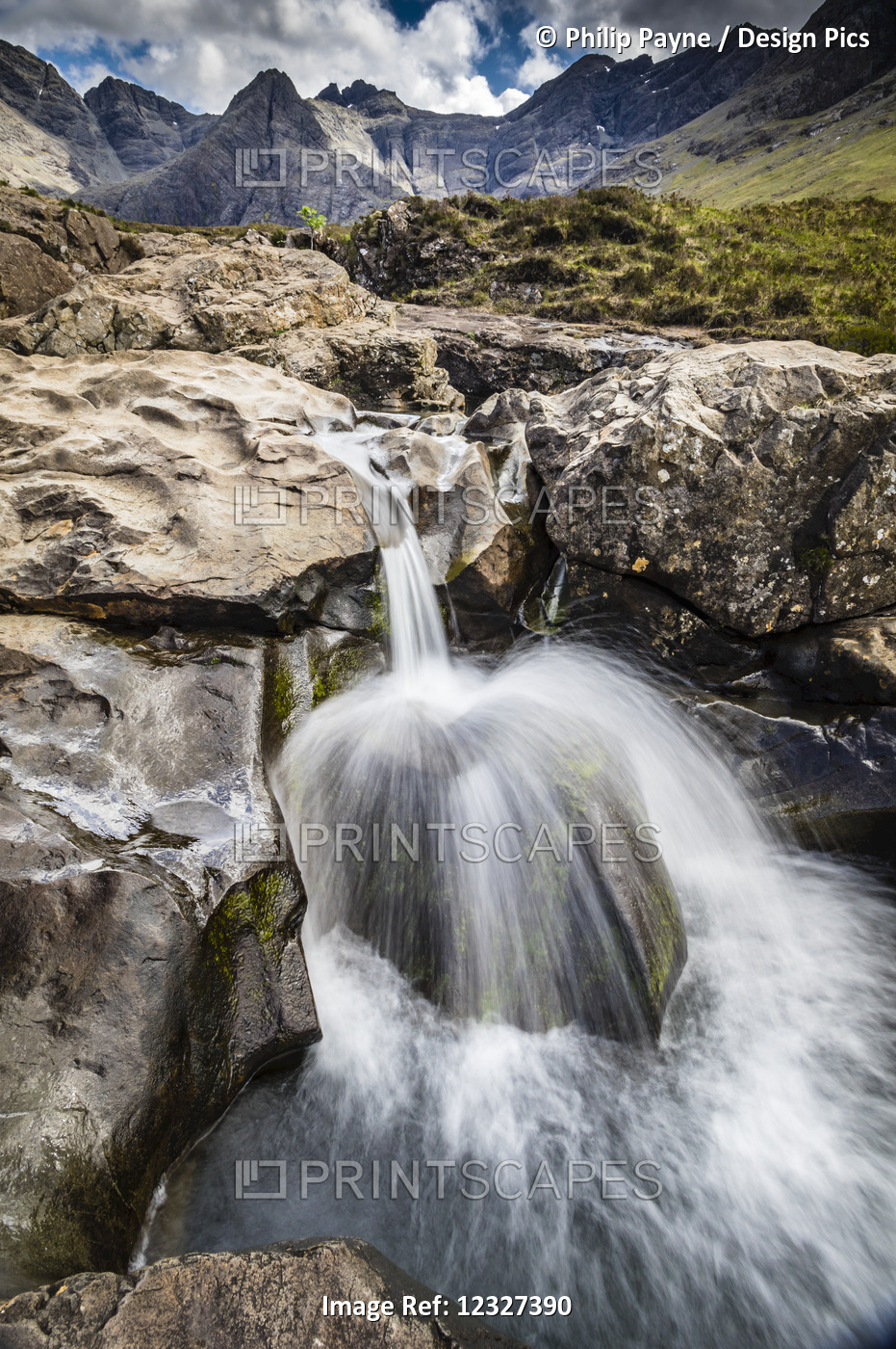 Water Splashing Over Rock At Fairy Pools; Glenn Brittle, Isle Of Skye, Scotland