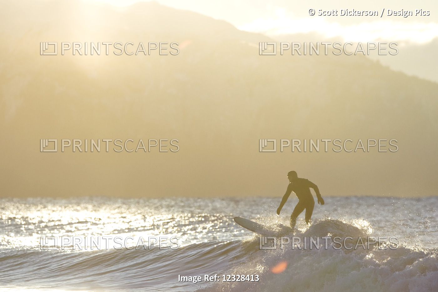 Silhouette Of A Surfer On A Wave In Kachemak Bay; Homer, Alaska, United States ...