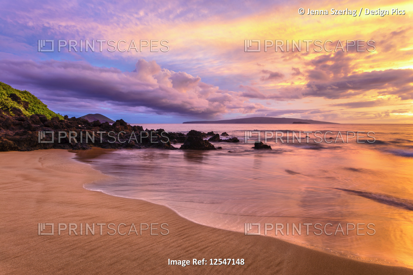 Dramatic Clouds Durning Sunset On Empty Beach in Makena, ,Maui, Hawaii USA 