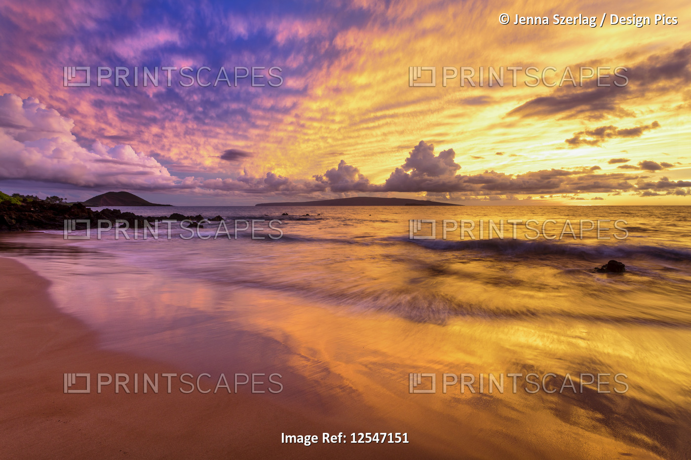 Dramatic Clouds Durning Colorful Beach Sunset in Makena, ,Maui, Hawaii USA 